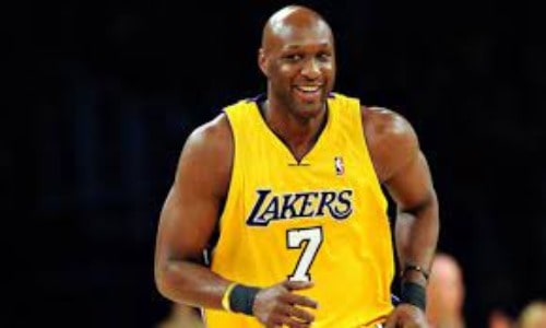 Lamar Odom wearing yellow jersey of his club Laker's.
